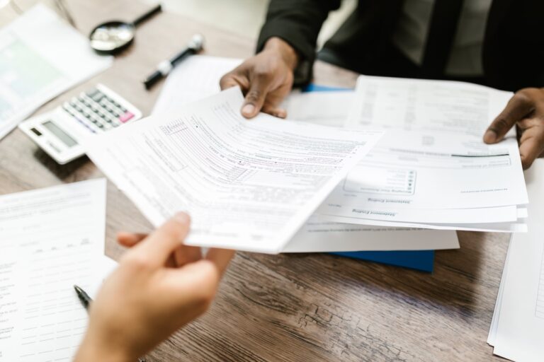 passing paper to apply for an insurance registration