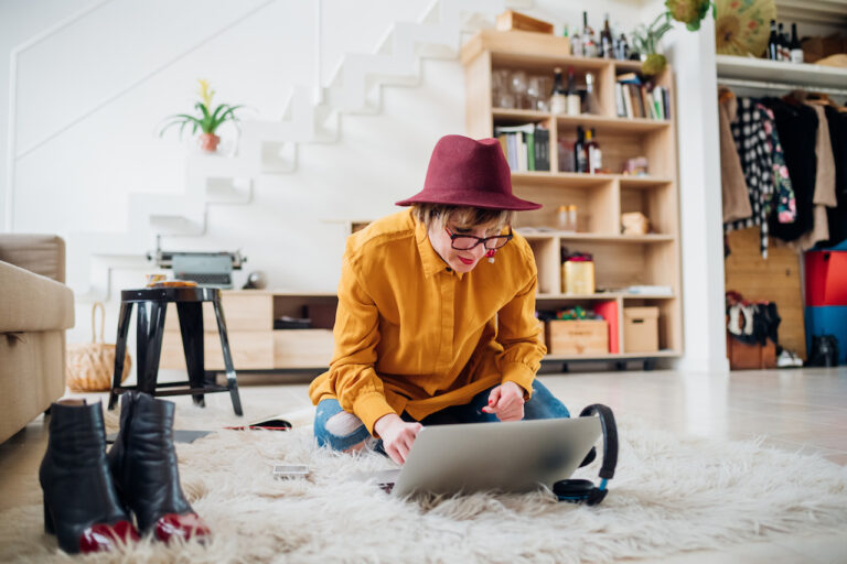 Adult freelance woman indoor at home smart working using computer